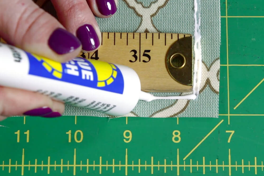 No Sew Outdoor Pillow DIY Tutorial - Gluing the pillow cover