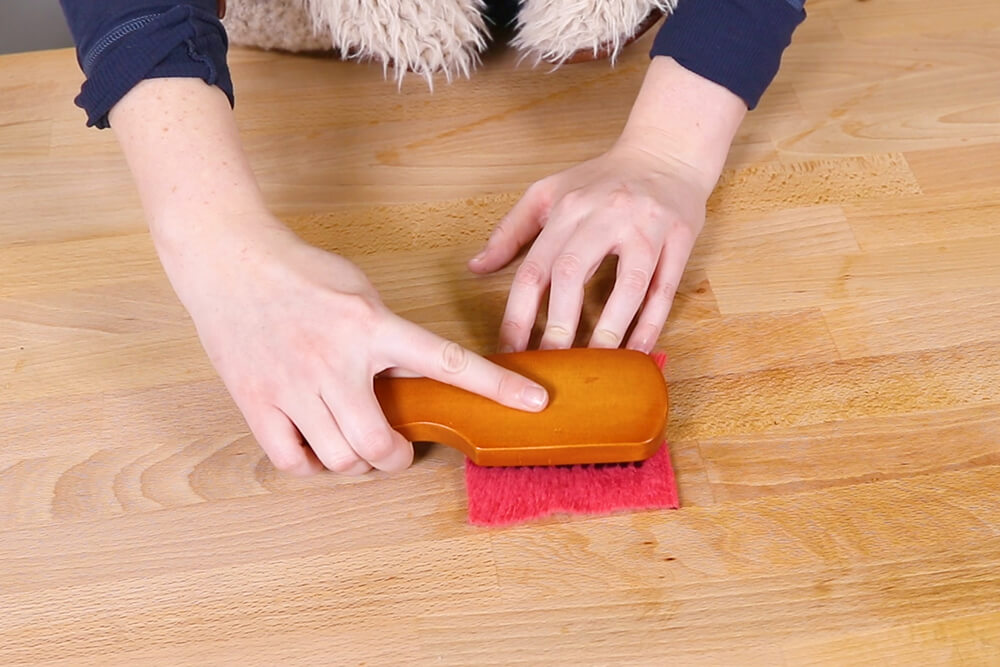 Brush out matted areas with boars hair brush
