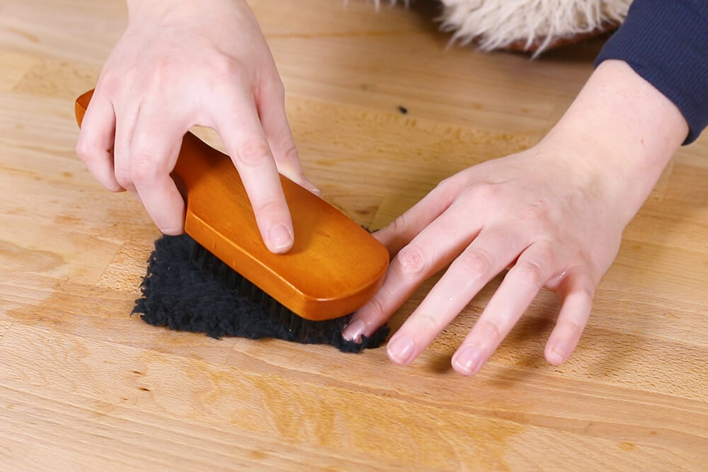 Brush out matted areas with boars hair brush