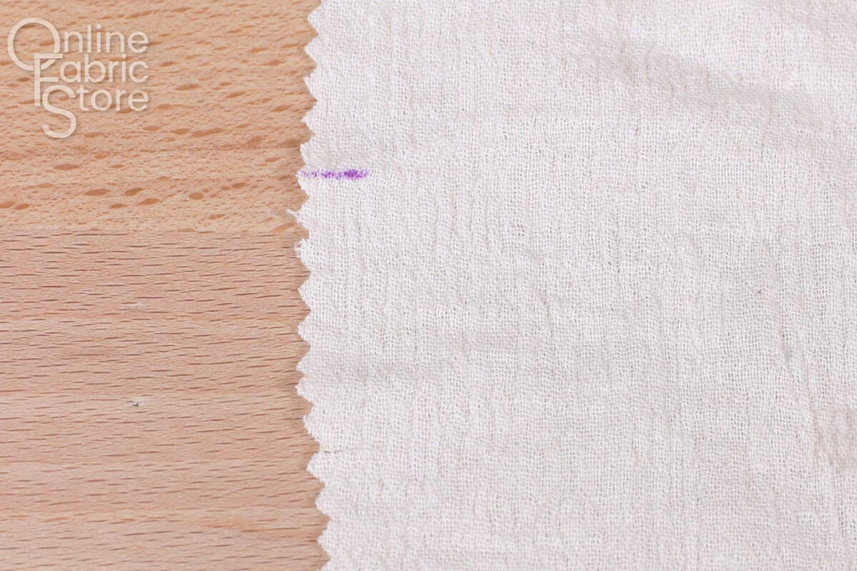 Marking notches in fabric